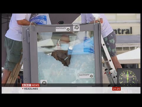 Josef Koeberl stands in ice to break the world record (Austria) - BBC News - 6th September 2020